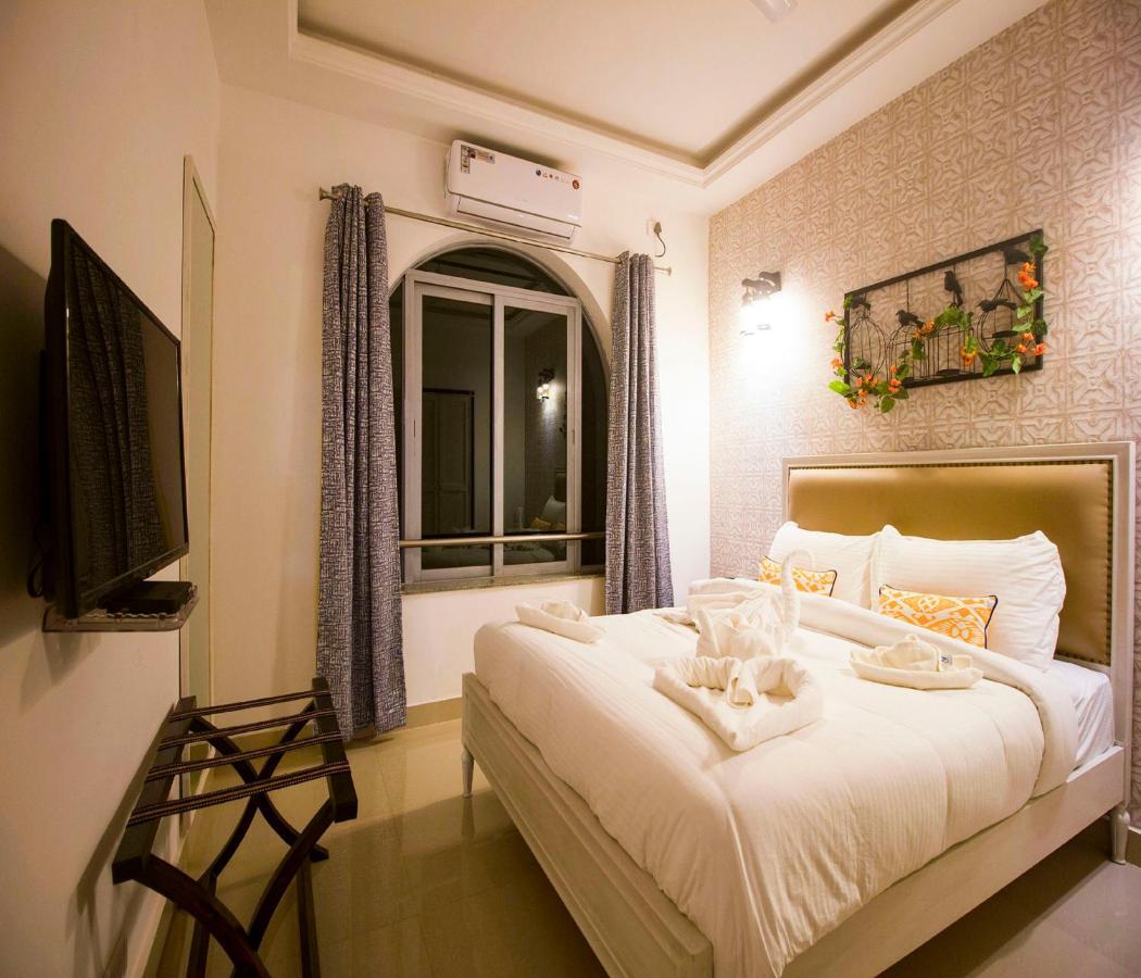 Span Suites & Villa Morjim Buitenkant foto