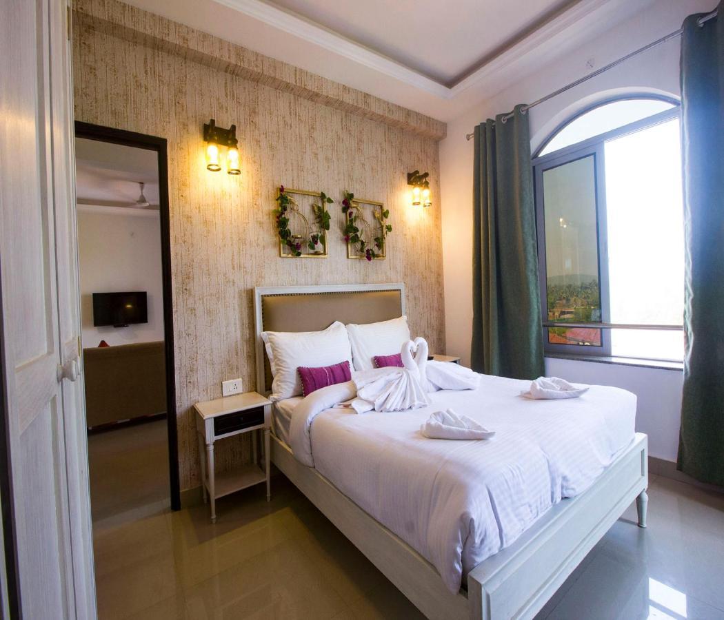 Span Suites & Villa Morjim Buitenkant foto